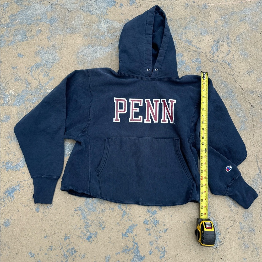 Champion navy blue hoodie with white embroidered Penn spellout
